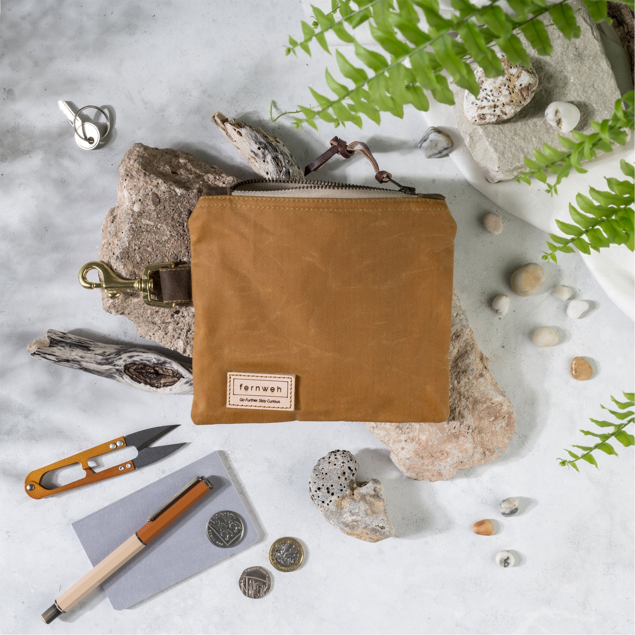 Handcrafted waxed cotton pouch bag by Fernweh UK. Perfect for storing those essentials, with a clip for easy, hands free storage onto a bag or belt. Handmade in Aberdeen, Scotland from Scottish waxed cotton canvas