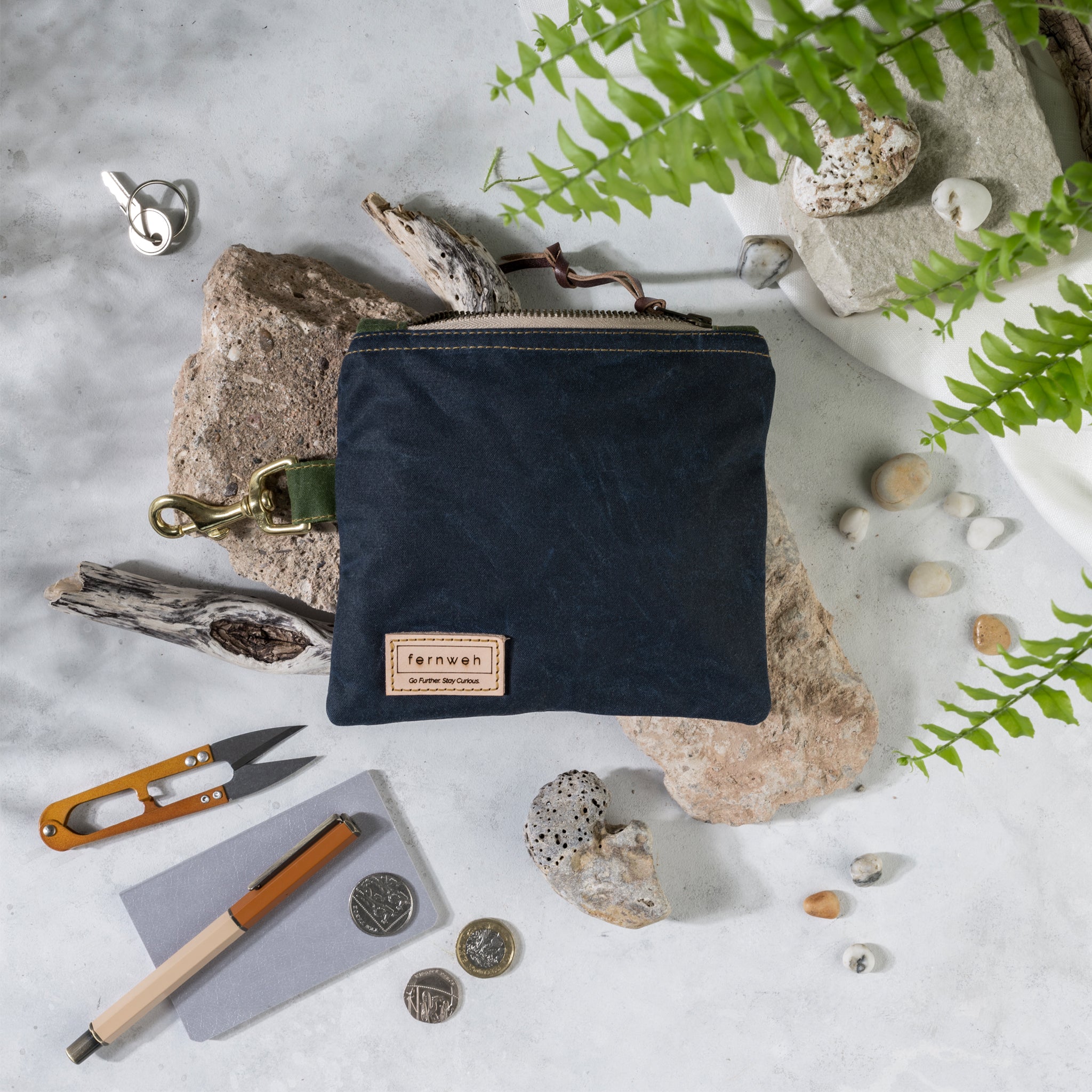 Handcrafted waxed cotton pouch bag by Fernweh UK. Perfect for storing those essentials, with a clip for easy, hands free storage onto a bag or belt. Handmade in Aberdeen, Scotland from Scottish waxed cotton canvas