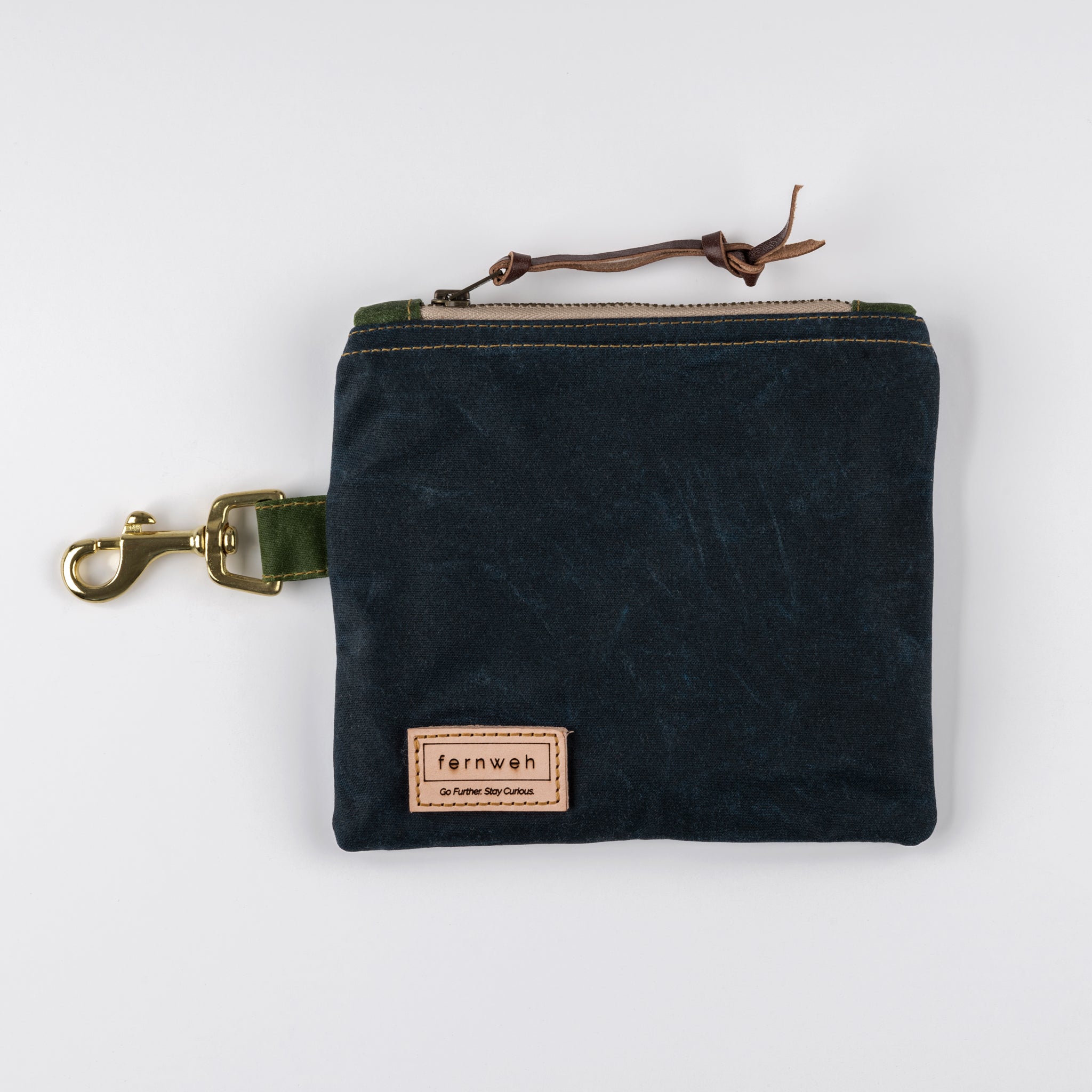 Handcrafted waxed cotton pouch bag by Fernweh UK. Perfect for storing those essentials, with a clip for easy, hands free storage onto a bag or belt. Handmade in Aberdeen, Scotland from Scottish waxed cotton canvas
