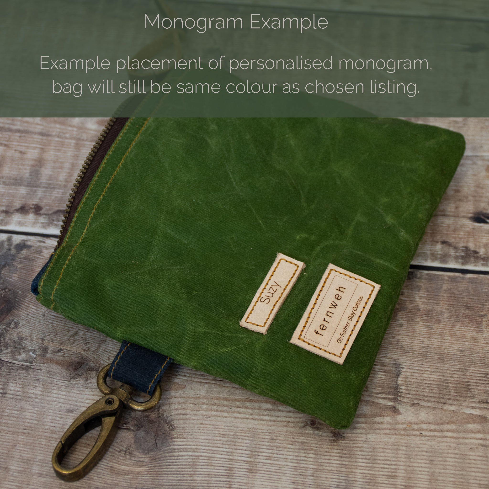 Image shows a waxed cotton canvas pouch in a moss green shade, with an example of the custom monogramming that is available.